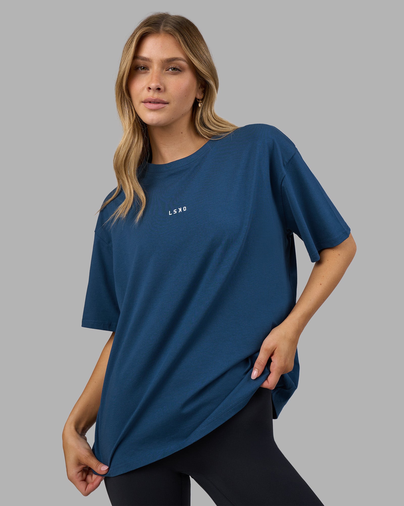 Woman wearing Go-To FLXCotton Oversized Tee - Indigo-White | Model:Leilani | Size:XS