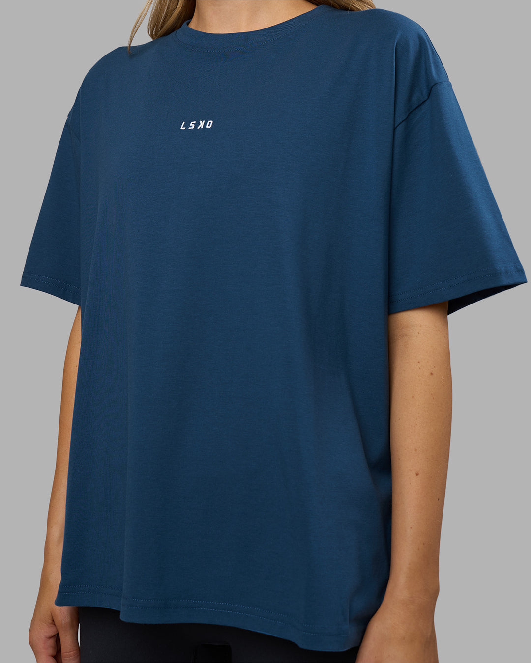 Woman wearing Go-To FLXCotton Oversized Tee - Indigo-White | Model:Leilani | Size:XS