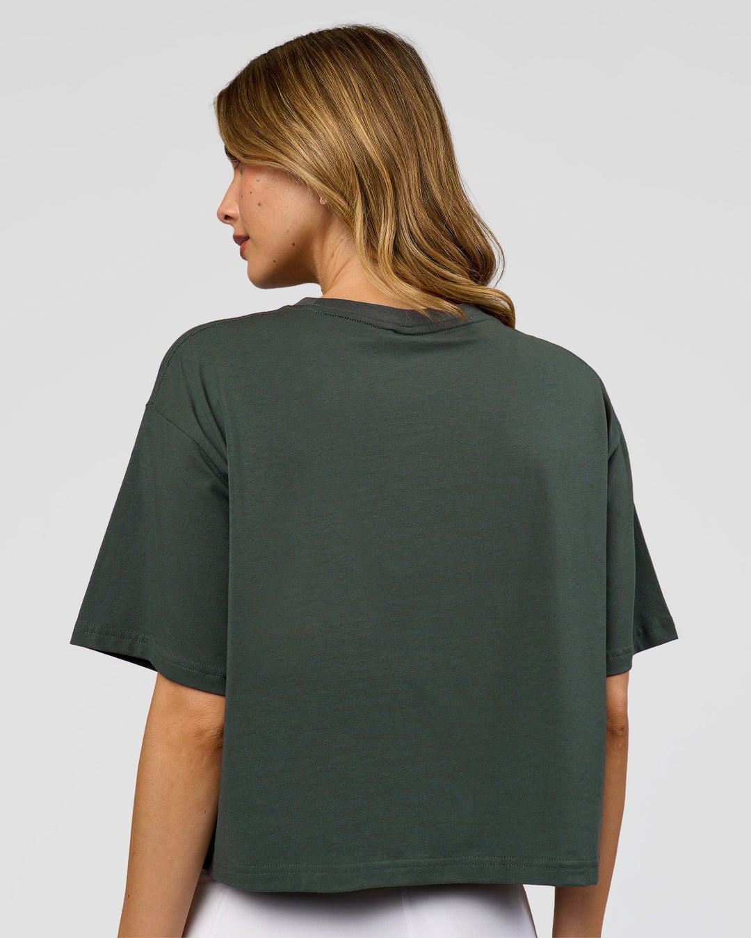 Woman wearing Go-To FLXCotton Skimmer Tee - Carbon Green-Carbon Green | Model:Leilani | Size:XS