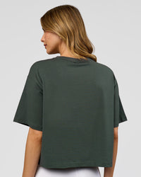 Woman wearing Go-To FLXCotton Skimmer Tee - Carbon Green-Carbon Green | Model:Leilani | Size:XS