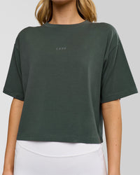 Woman wearing Go-To FLXCotton Skimmer Tee - Carbon Green-Carbon Green | Model:Leilani | Size:XS