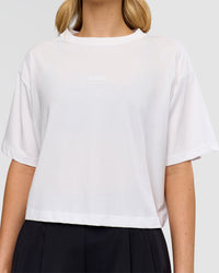 Woman wearing Go-To FLXCotton Skimmer Tee - White-White | Model:Leilani | Size:XS