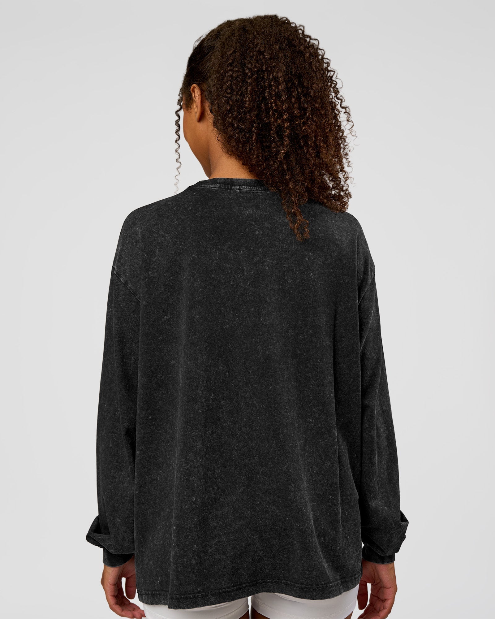Woman wearing Go-To Long Sleeve FLXCotton Oversized Tee - Black Washed-White | Model:Jordan | SIze:XS