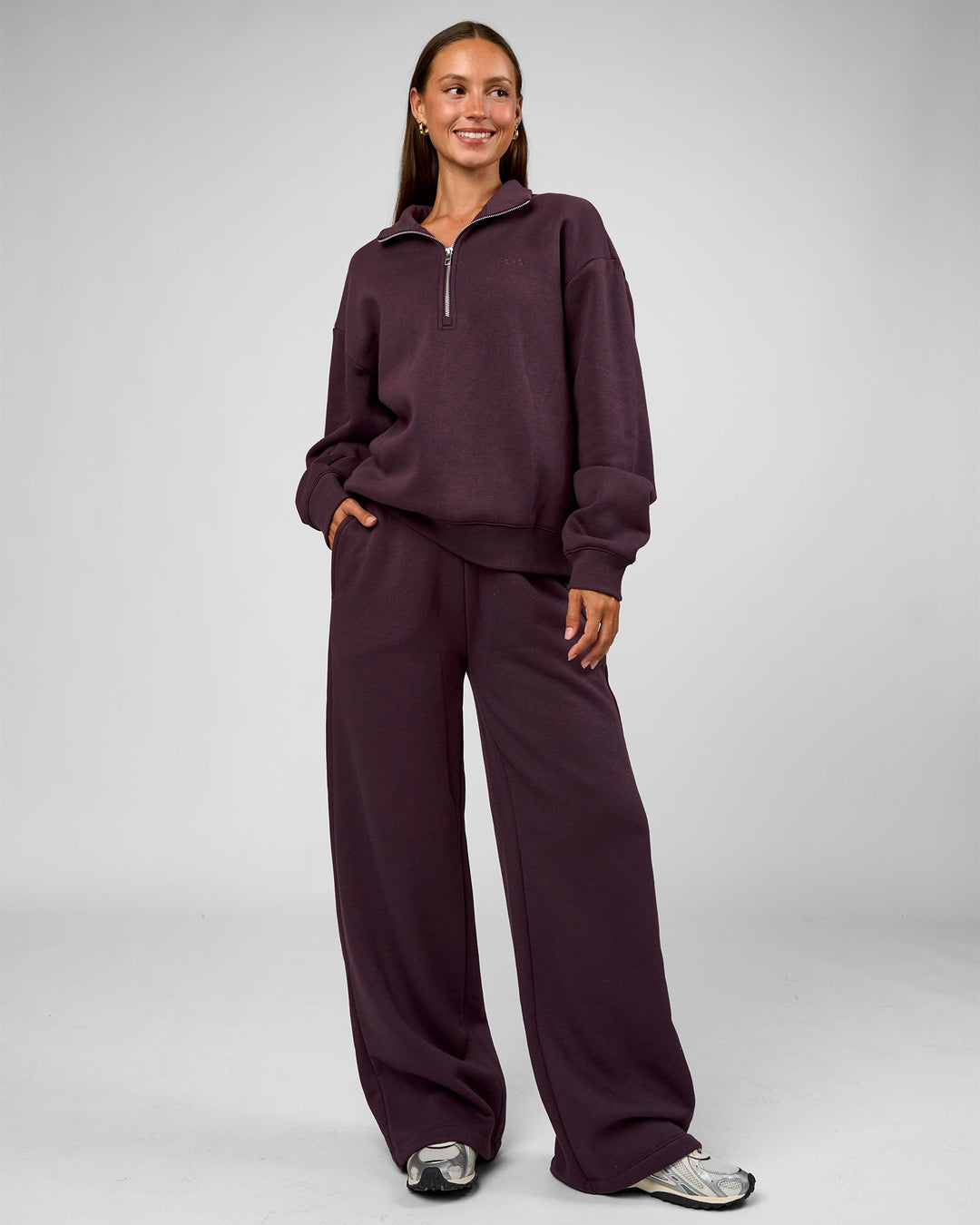 Woman wearing Go-To Oversized Quarter Zip Sweater - Midnight Plum | Model:Brylee | Size:XS