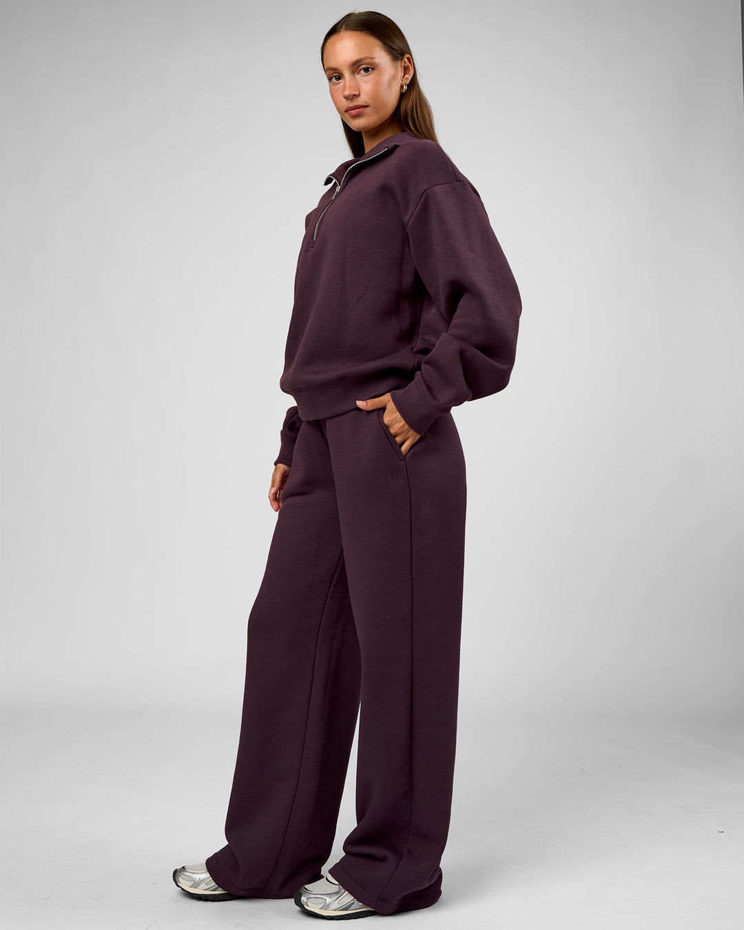 Woman wearing Go-To Oversized Quarter Zip Sweater - Midnight Plum | Model:Brylee | Size:XS