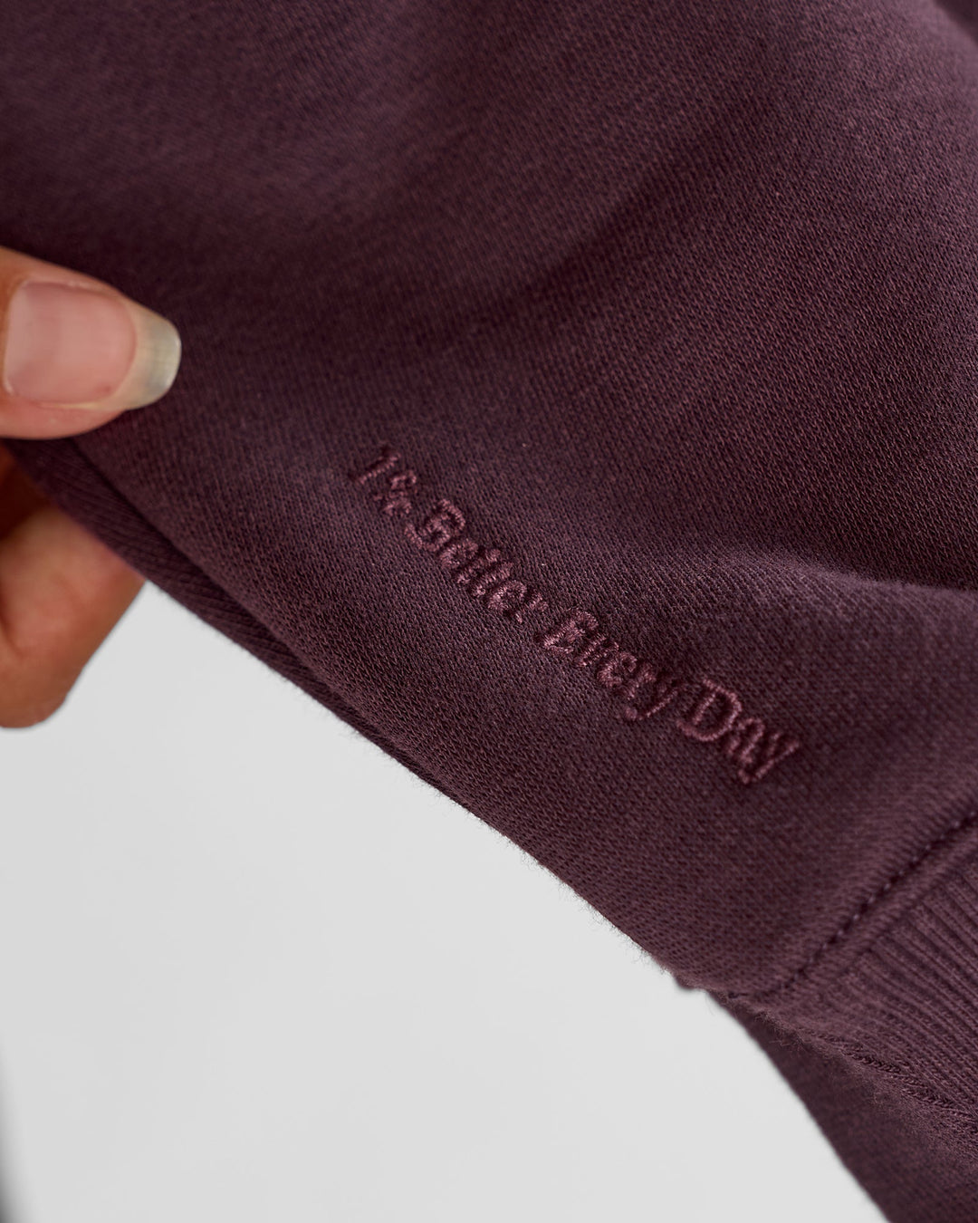 Woman wearing Go-To Oversized Quarter Zip Sweater - Midnight Plum | Model:Brylee | Size:XS