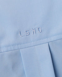 Woman wearing Go-To Oversized Shirt - Poplin Blue | Model:Leilani | Size:XS