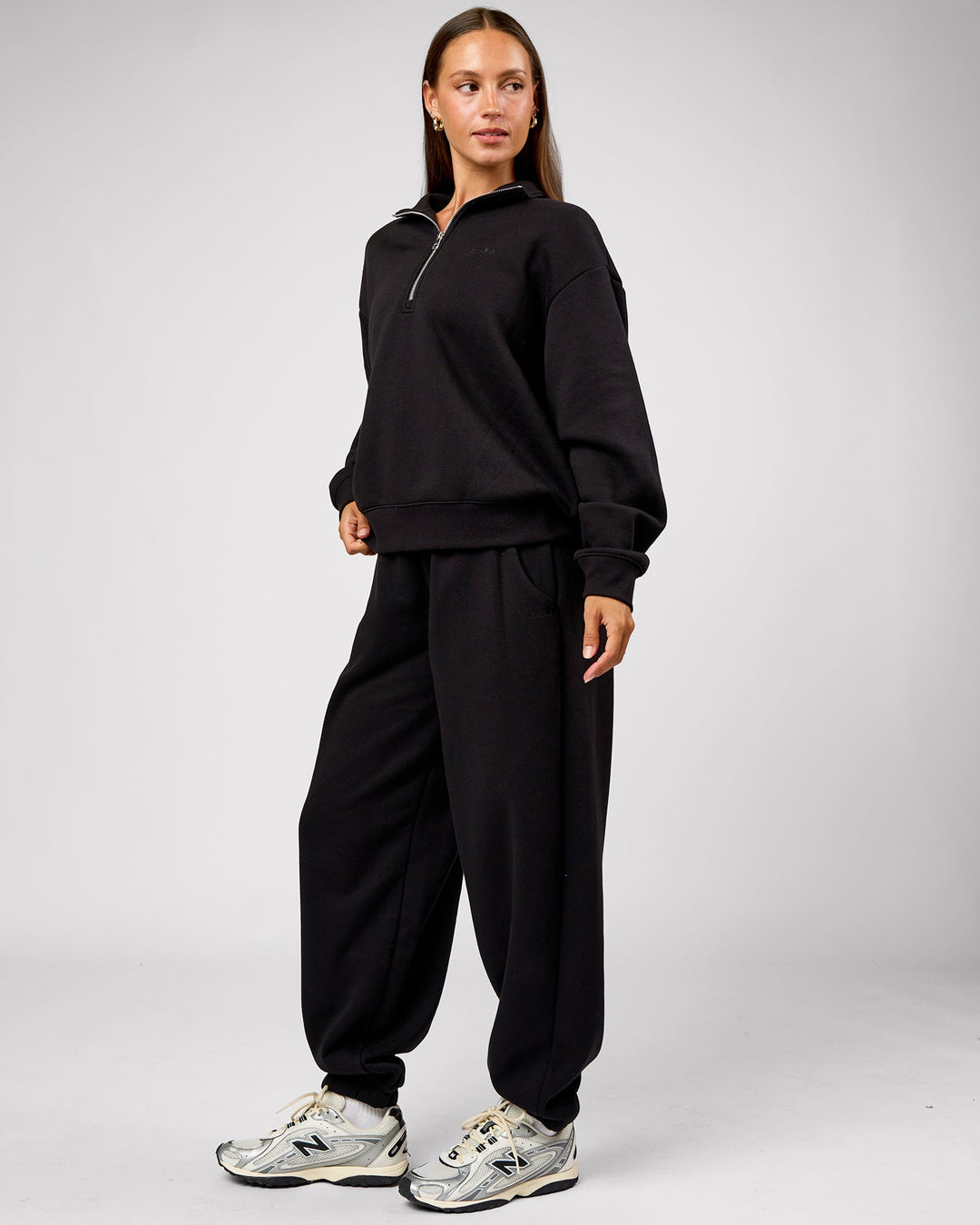 Woman wearing Go-To Oversized Track Pant - Black | Model:Brylee | Size:XS - view 5