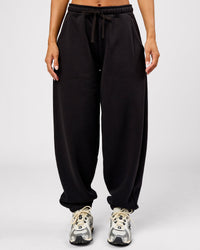 Woman wearing Go-To Oversized Track Pant - Black | Model:Brylee | Size:XS | Thumbnail Index: 0