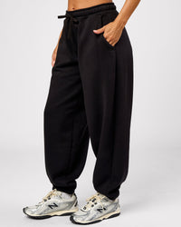 Woman wearing Go-To Oversized Track Pant - Black | Model:Brylee | Size:XS | Thumbnail Index: 6