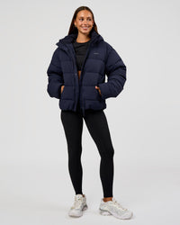 Woman wearing Go-To Puffer Jacket - Future Navy | Model:Brylee | Size:XS