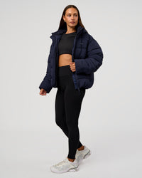 Woman wearing Go-To Puffer Jacket - Future Navy | Model:Brylee | Size:XS