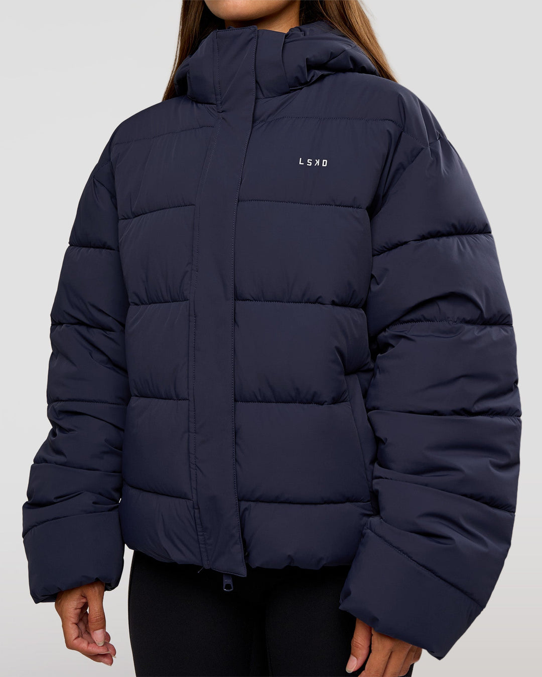 Woman wearing Go-To Puffer Jacket - Future Navy | Model:Brylee | Size:XS