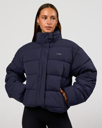 Woman wearing Go-To Puffer Jacket - Future Navy | Model:Brylee | Size:XS