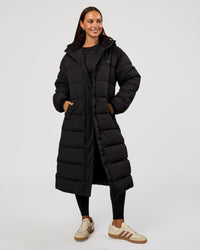 Woman wearing Go-To Puffer Long Jacket - Black | Model:Brylee | Size:XS