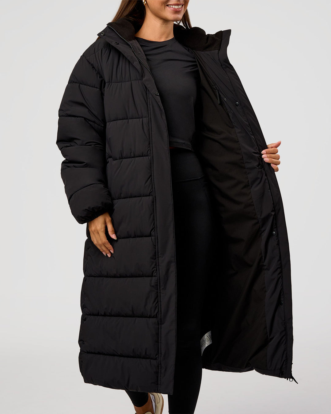 Woman wearing Go-To Puffer Long Jacket - Black | Model:Brylee | Size:XS