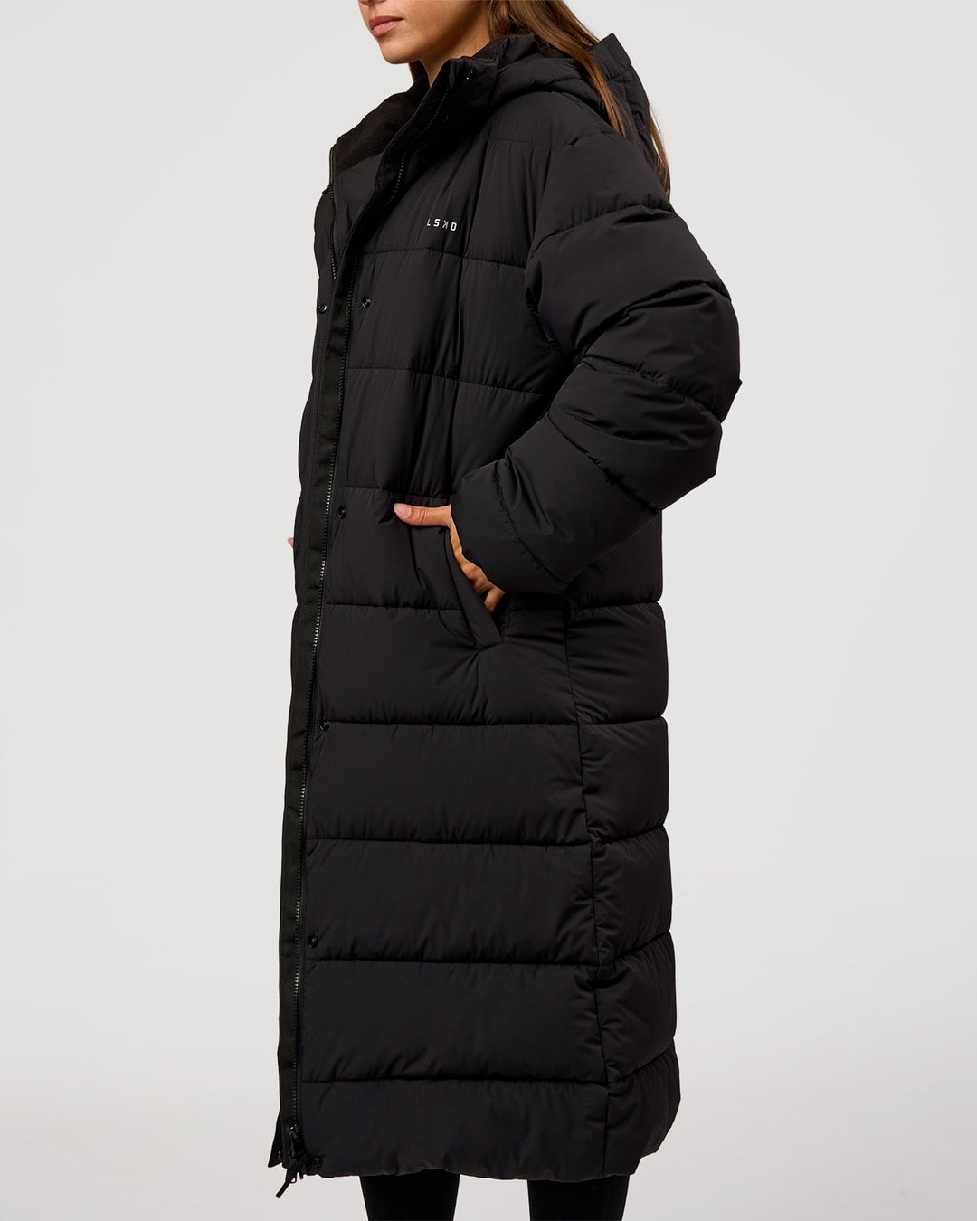 Woman wearing Go-To Puffer Long Jacket - Black | Model:Brylee | Size:XS