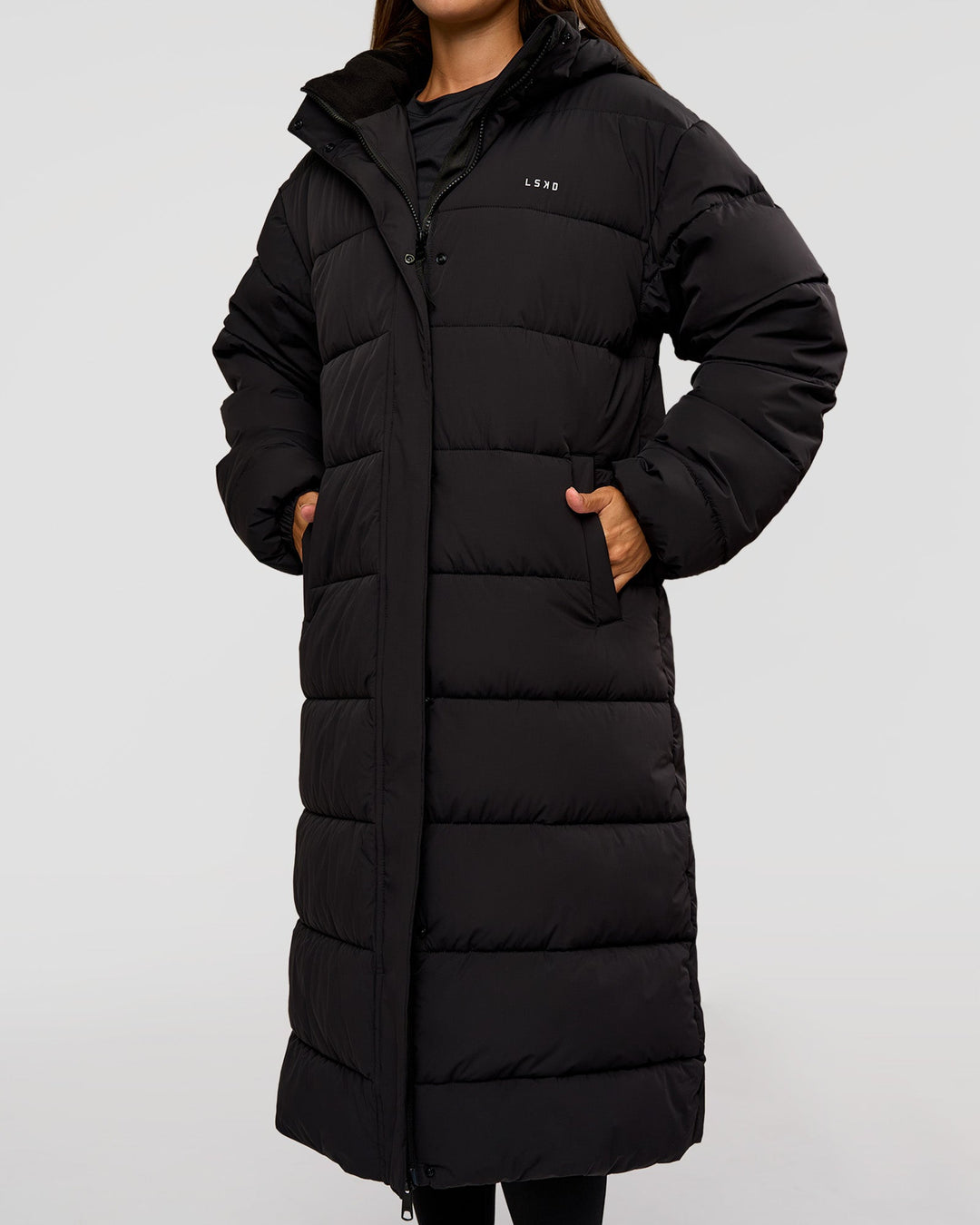 Woman wearing Go-To Puffer Long Jacket - Black | Model:Brylee | Size:XS