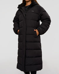 Woman wearing Go-To Puffer Long Jacket - Black | Model:Brylee | Size:XS