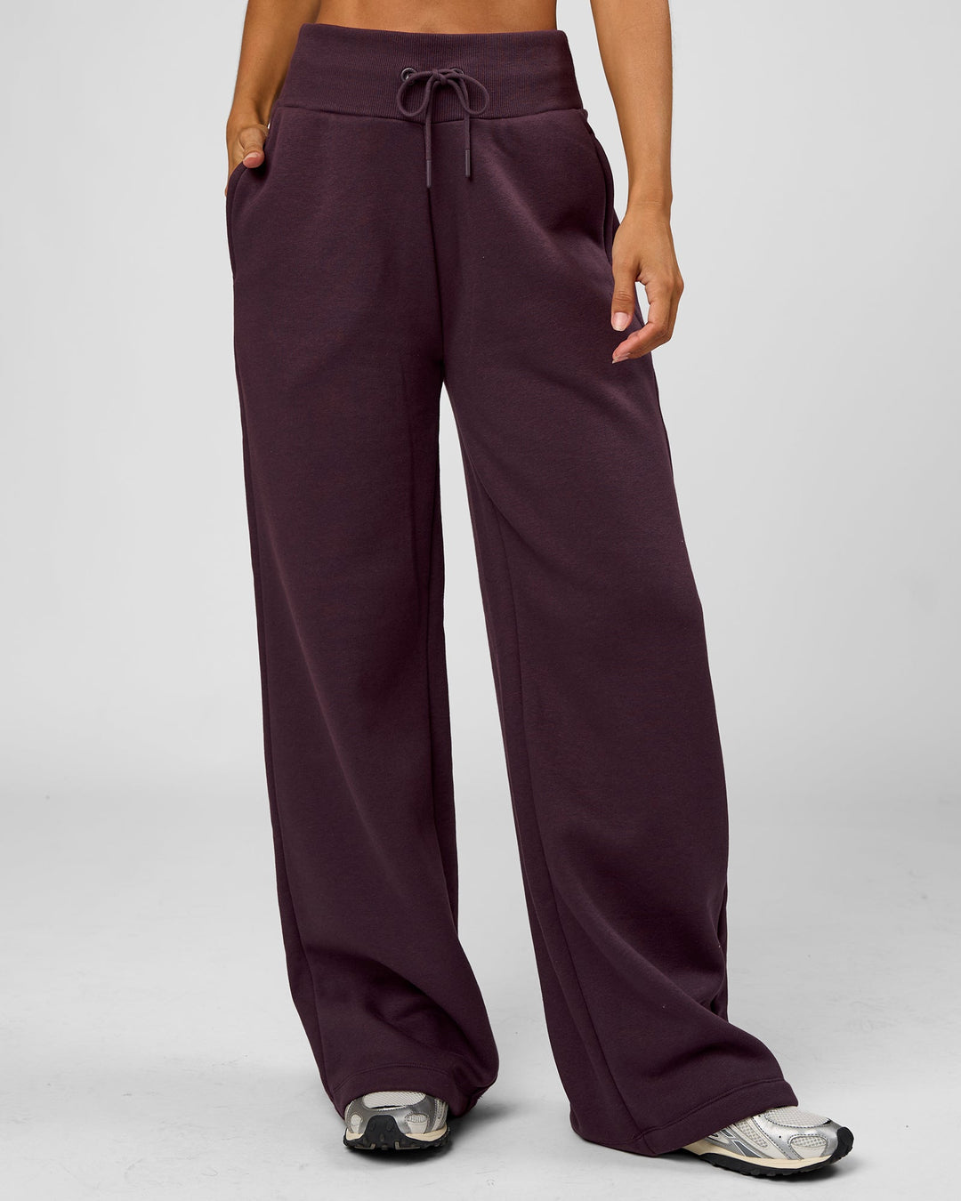 Woman wearing Go-To Wide Leg Track Pant - Midnight Plum | Model:Jaimee | Size:XS