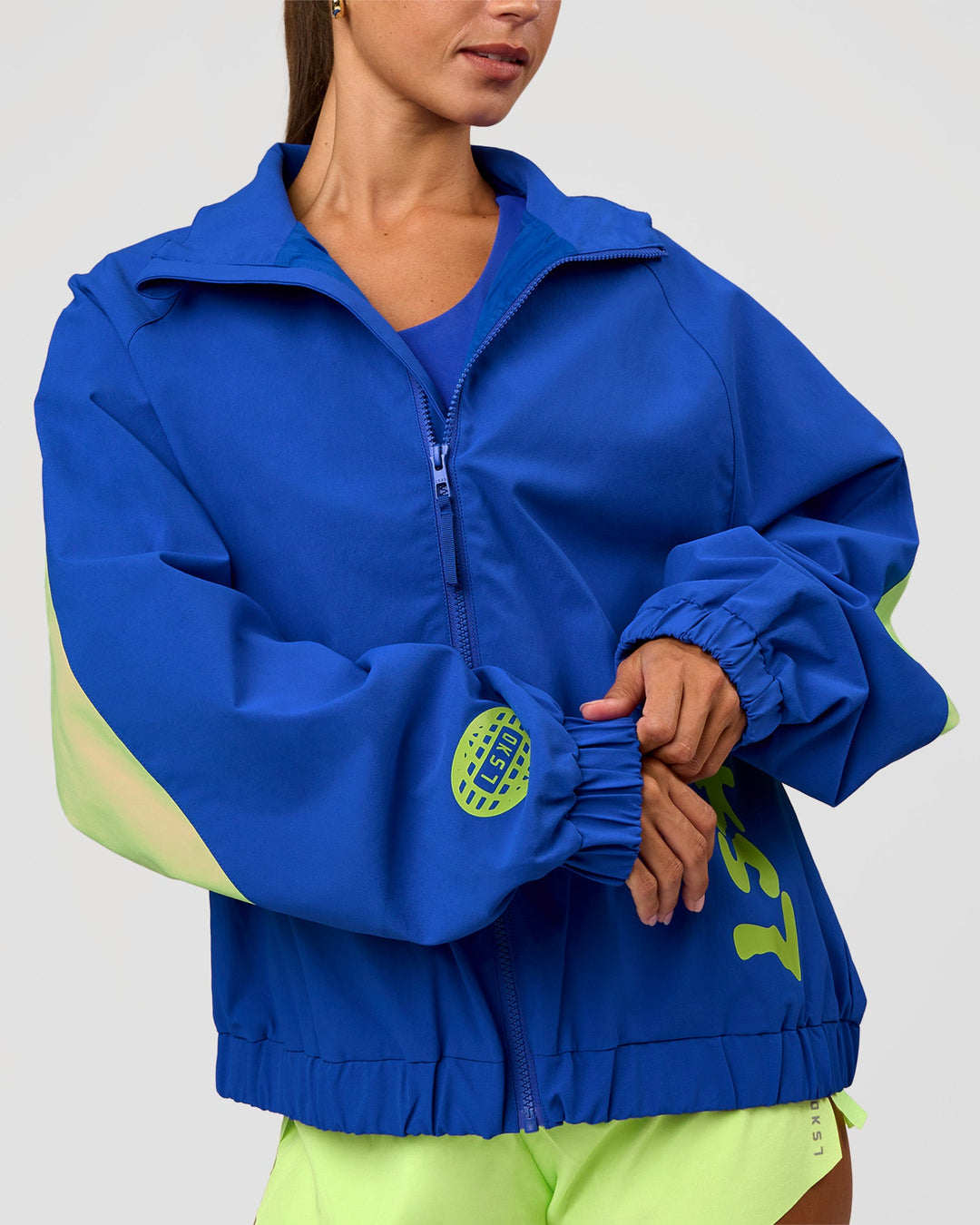 Woman wearing Hype Oversized Track Jacket - Electric Indigo | Model:Brylee | Size:XS