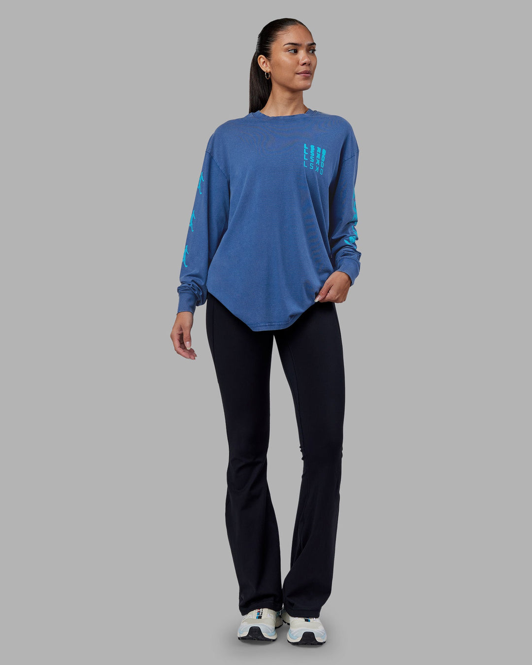 Woman wearing Inferno Journey FLXCotton Oversized Long Sleeve Tee - Midnight Blue-Blue Bird | Model:Rhiley | Size:XS