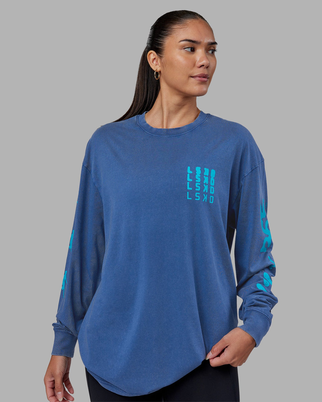 Woman wearing Inferno Journey FLXCotton Oversized Long Sleeve Tee - Midnight Blue-Blue Bird | Model:Rhiley | Size:XS