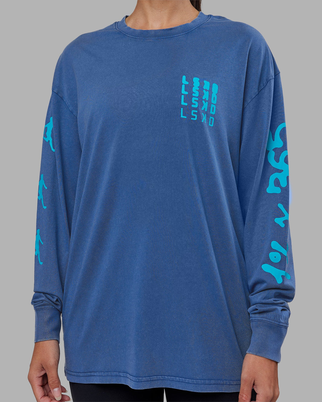 Woman wearing Inferno Journey FLXCotton Oversized Long Sleeve Tee - Midnight Blue-Blue Bird | Model:Rhiley | Size:XS
