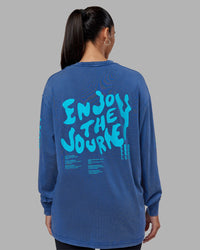 Woman wearing Inferno Journey FLXCotton Oversized Long Sleeve Tee - Midnight Blue-Blue Bird | Model:Rhiley | Size:XS