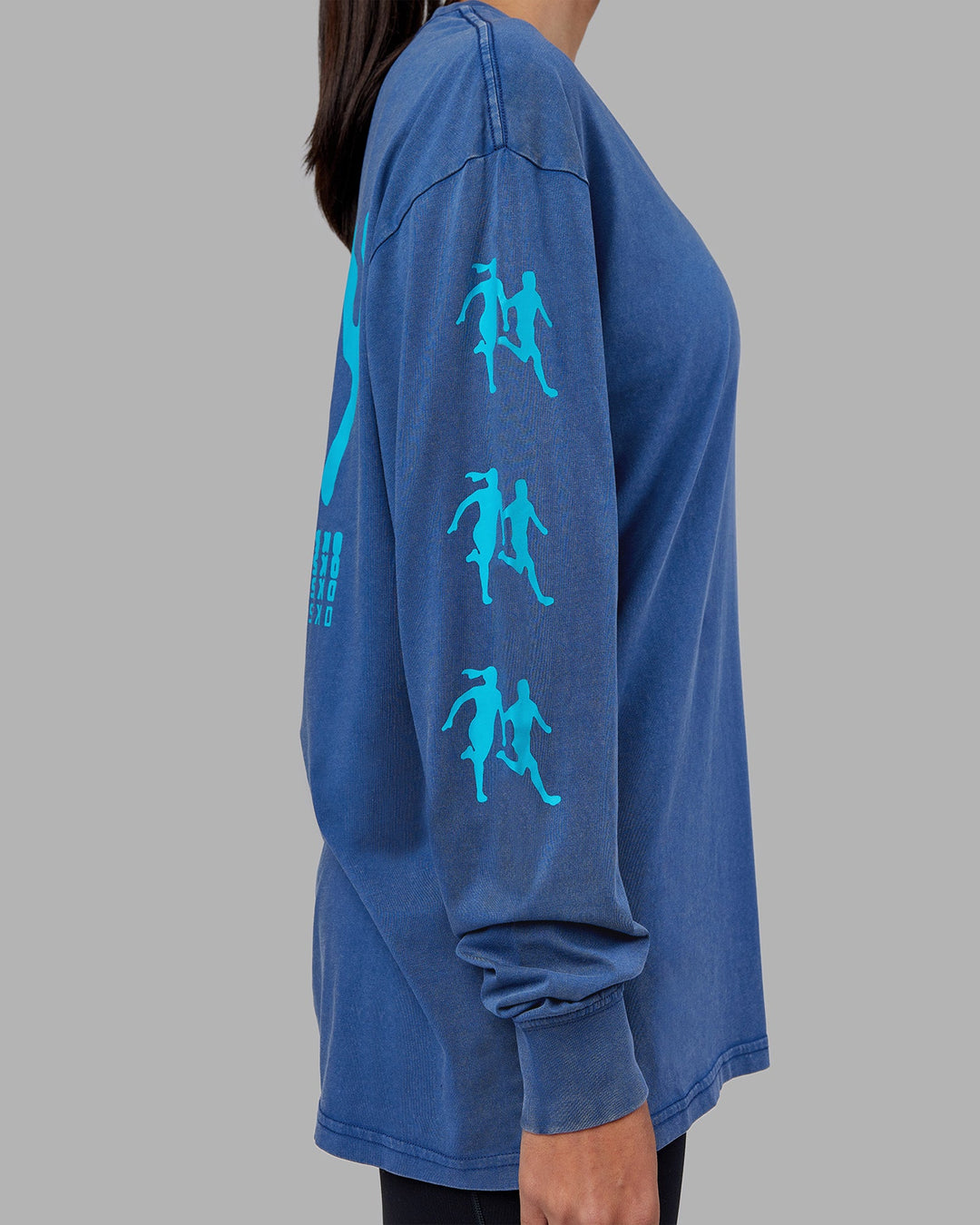 Woman wearing Inferno Journey FLXCotton Oversized Long Sleeve Tee - Midnight Blue-Blue Bird | Model:Rhiley | Size:XS