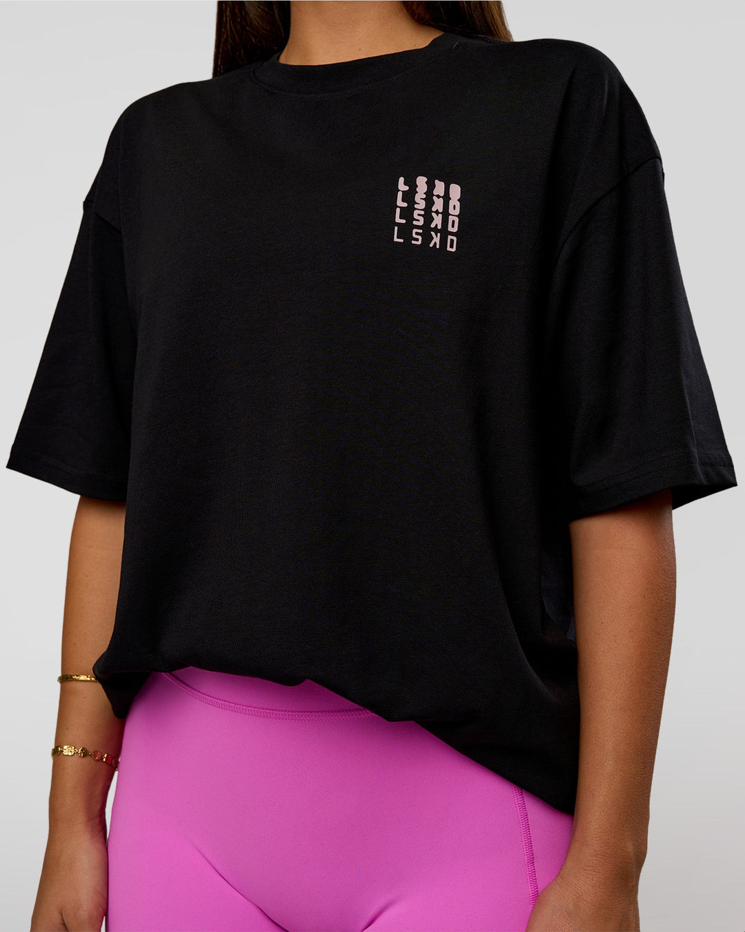 Woman wearing Inferno Journey FLXCotton Oversized Tee - Black-Ultra Fuchsia | Model:Bianca | Size:XS