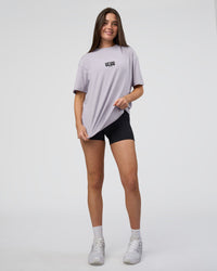 Woman wearing Kettle B FLXCotton Oversized Tee - Galactic Lilac-Black | Model:Estella | Size:XS | Thumbnail Index: 6