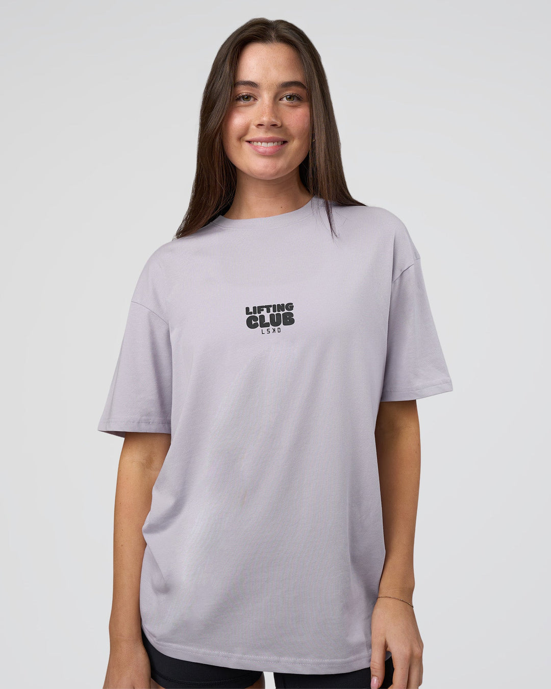 Woman wearing Kettle B FLXCotton Oversized Tee - Galactic Lilac-Black | Model:Estella | Size:XS - view 4