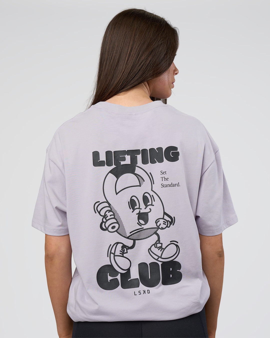 Woman wearing Kettle B FLXCotton Oversized Tee - Galactic Lilac-Black | Model:Estella | Size:XS - view 5