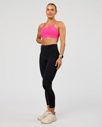 Woman wearing Lift Sports Bra - Ultra Pink | Model:Maja | Size:XS