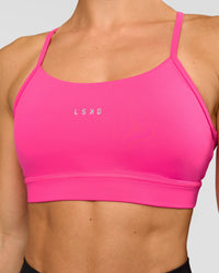 Woman wearing Lift Sports Bra - Ultra Pink | Model:Maja | Size:XS