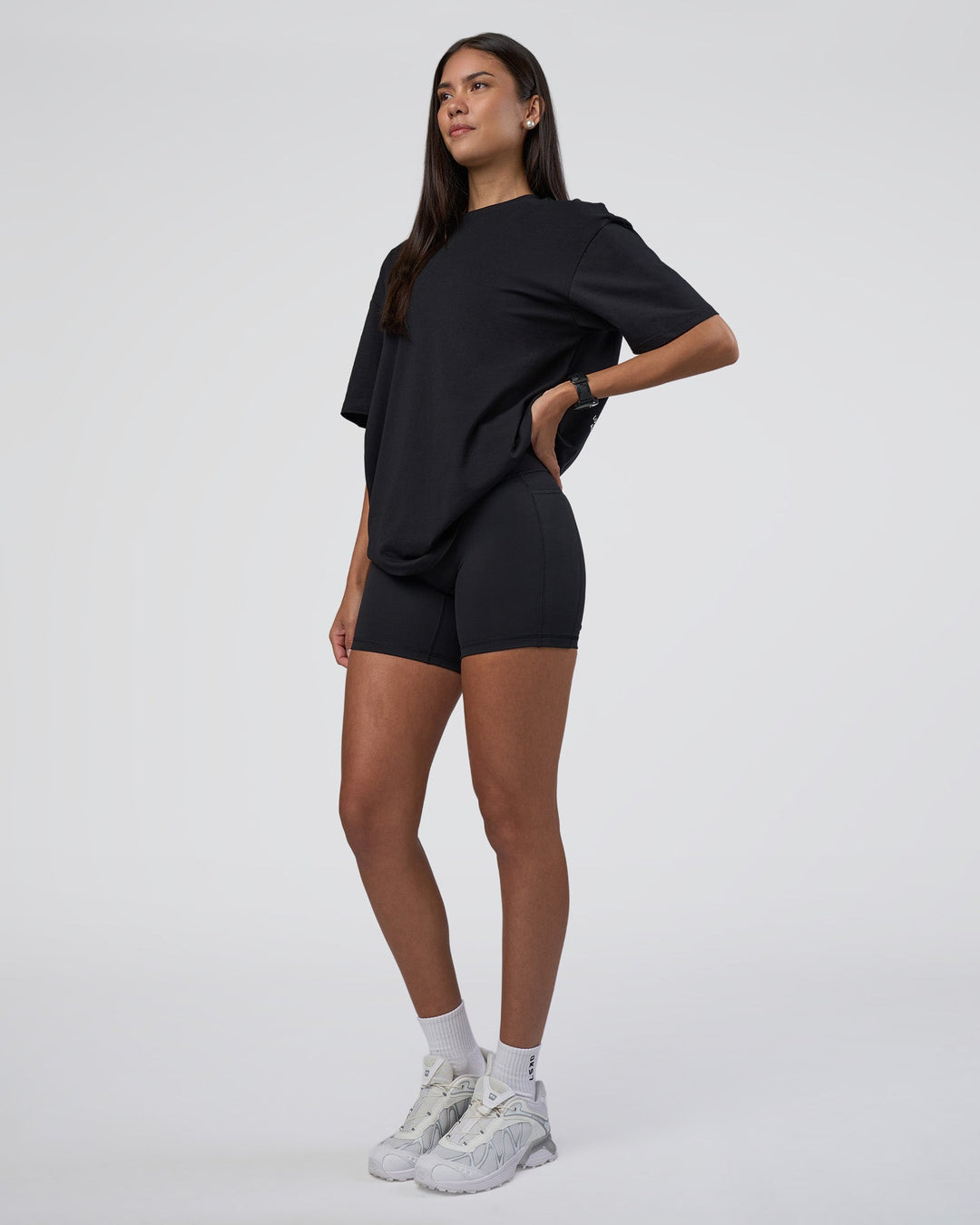 Woman wearing Lifting Club FLXCotton Tee Oversize - Black-White-Red | Model:Rhiley | Size:XS