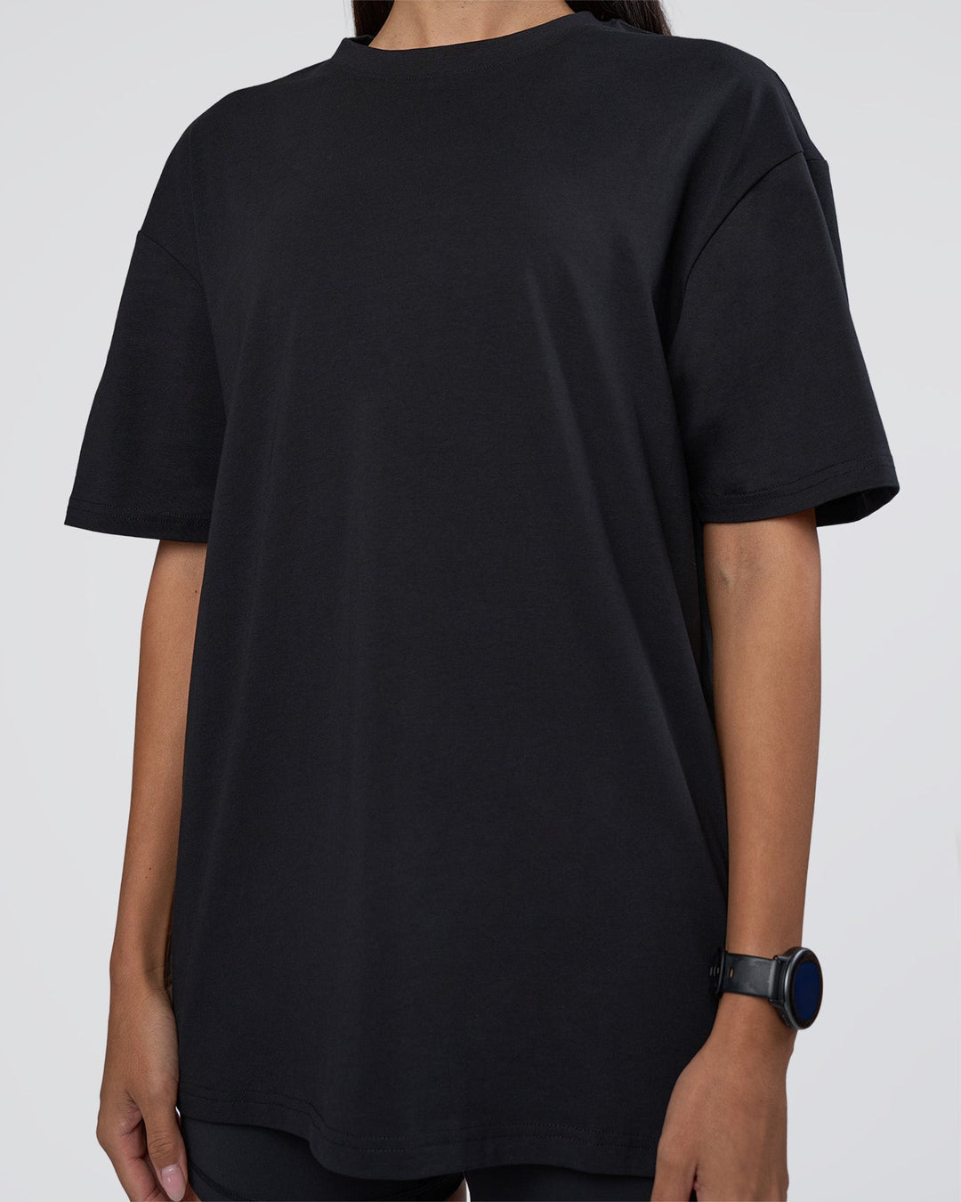 Woman wearing Lifting Club FLXCotton Tee Oversize - Black-White-Red | Model:Rhiley | Size:XS