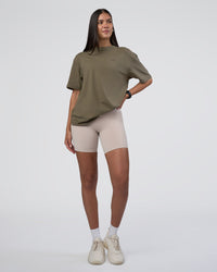 Woman wearing Lifting FLXCotton Oversized Tee - Walnut Grey-Hot Chocolate | Model:Rhiley | Size:XS