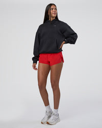 Woman wearing Lifting Unisex Oversized Hoodie - Black-Flame| Model:Rhiley | Size:XS