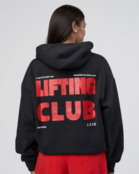 Woman wearing Lifting Unisex Oversized Hoodie - Black-Flame| Model:Rhiley | Size:XS