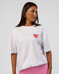 Woman wearing Love the Journey FLXCotton Oversized Tee - White-Candy Pink | Model:Bianca | Size:XS