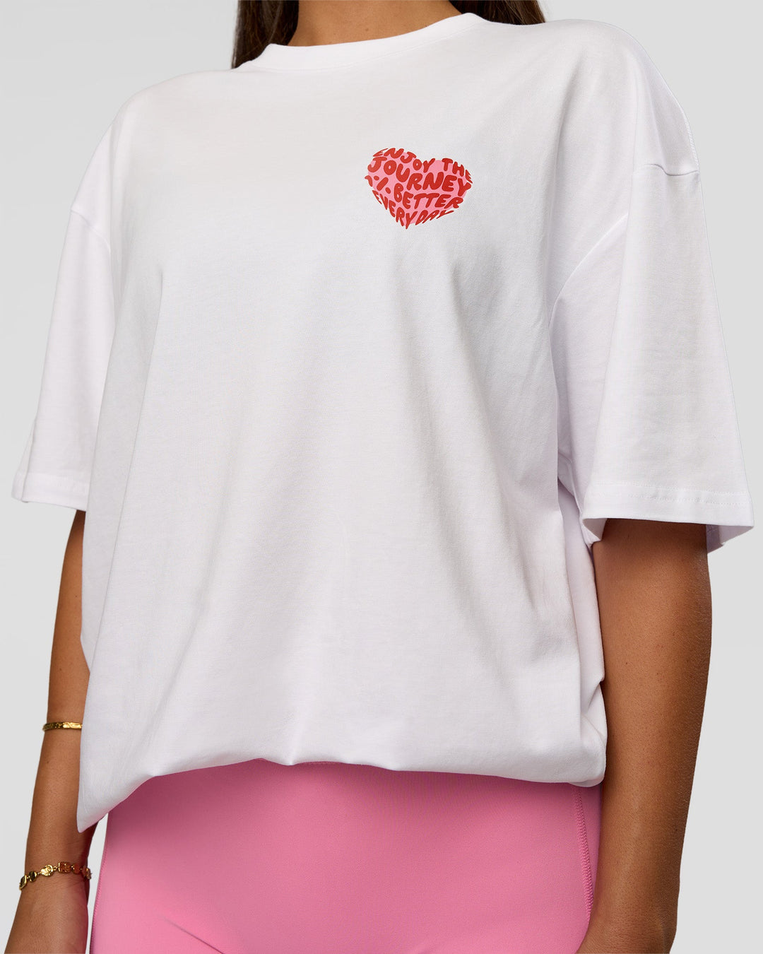 Woman wearing Love the Journey FLXCotton Oversized Tee - White-Candy Pink | Model:Bianca | Size:XS