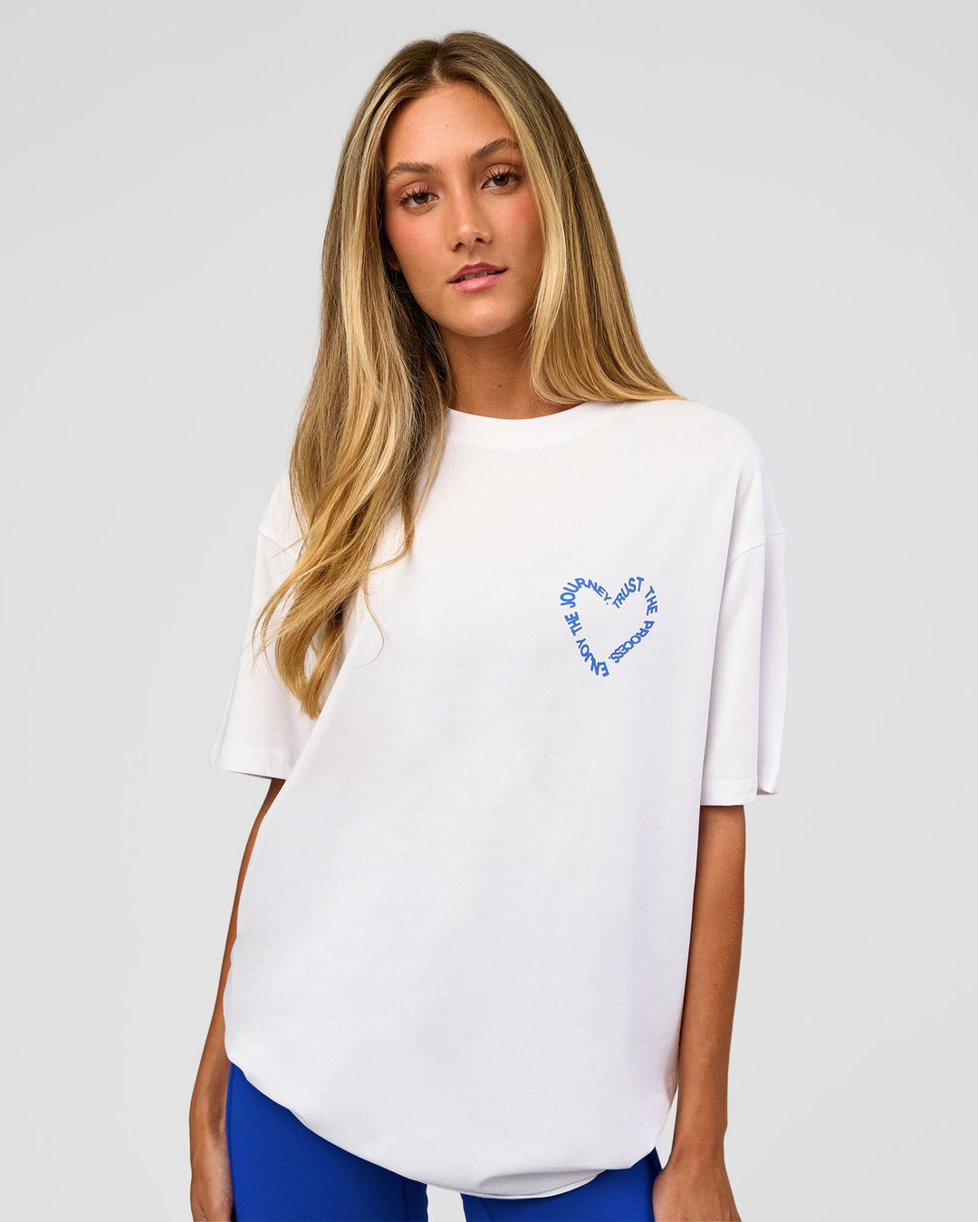 Woman wearing Love The Process FLXCotton Oversize Tee - White-Electric Indigo | Model:Georgia | Size:XS - view 5