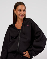 Woman wearing Love The Process Zip Through Hoodie - Black-Sugar Plum | Model:Brylee | Size:XS