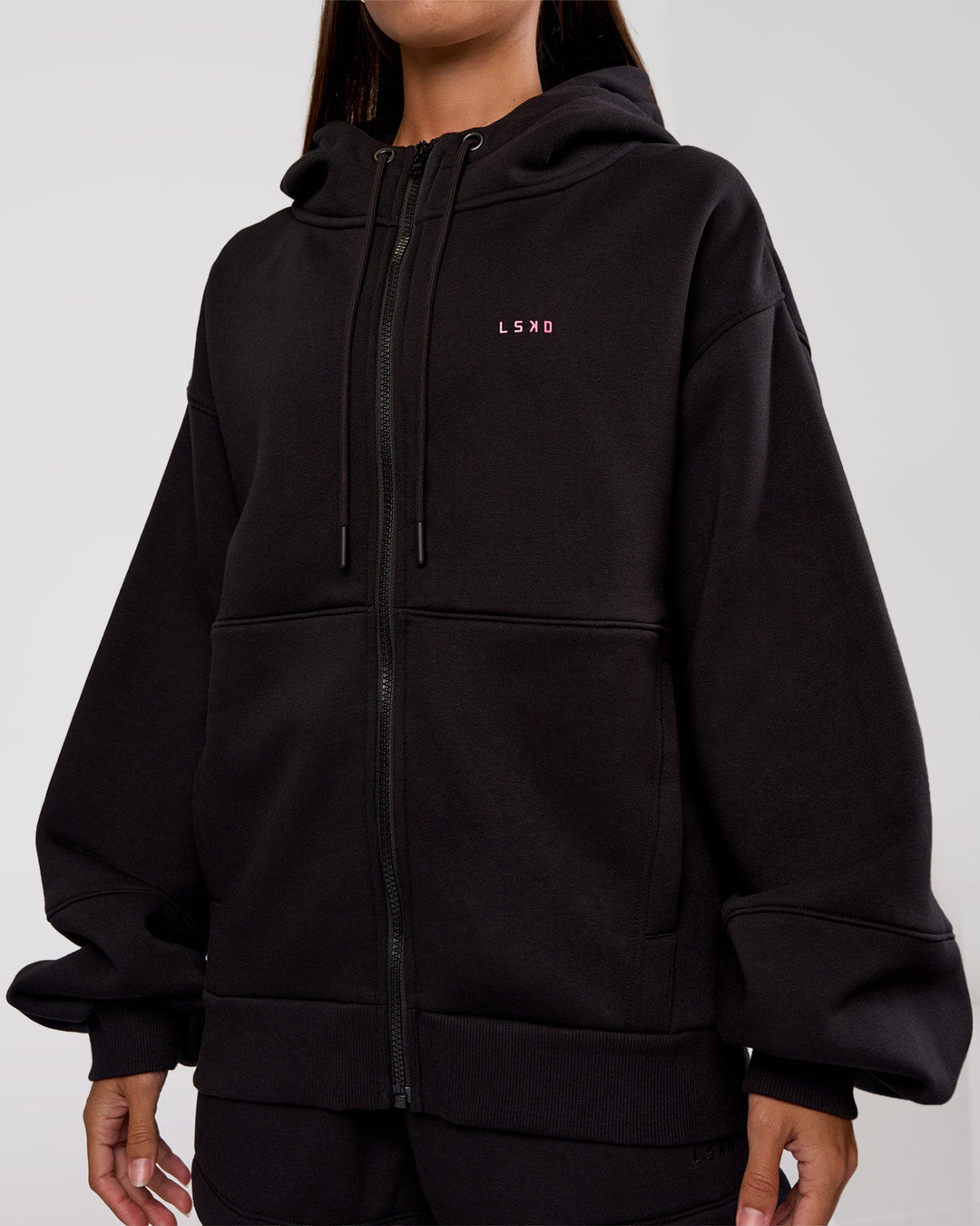 Woman wearing Love The Process Zip Through Hoodie - Black-Sugar Plum | Model:Brylee | Size:XS