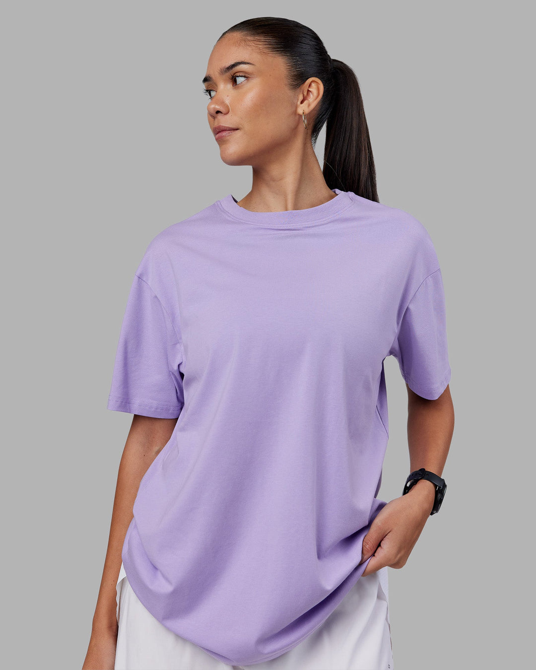 Woman wearing Love The Run FLXCotton Tee Oversize - Violet Ray-Royal Purple | Model:Rhiley | Size:XS