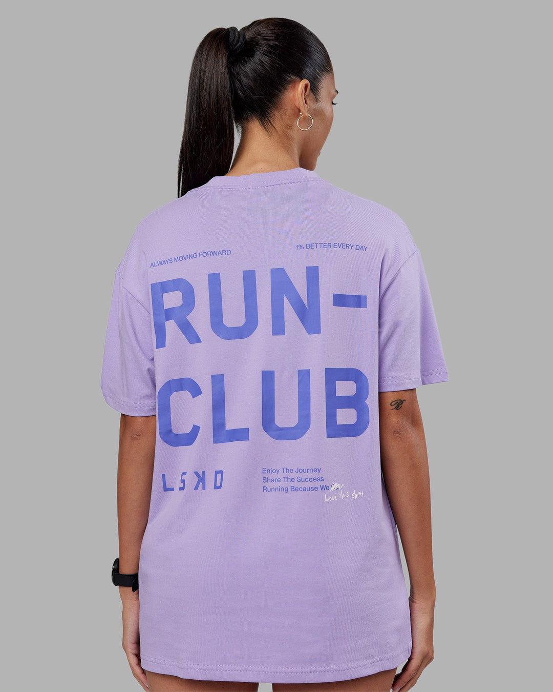 Woman wearing Love The Run FLXCotton Tee Oversize - Violet Ray-Royal Purple | Model:Rhiley | Size:XS