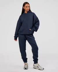 Woman wearing MVP Oversized Hoodie - Future Navy | Model:Brylee | Size:XS