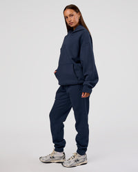 Woman wearing MVP Oversized Hoodie - Future Navy | Model:Brylee | Size:XS